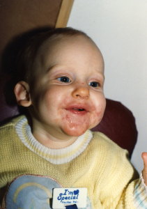 Young Timmy makes kissy face with his messy face