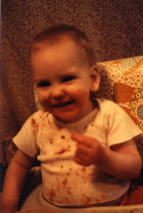 Baby Rebekah with spaghetti sauce everywhere