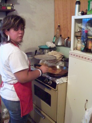 Rebekah J. dipping tortillas