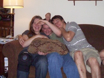 Steve hugging Daniel and Debbie