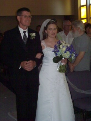 Debbie and HJ coming up the aisle