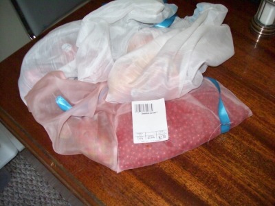 Several produce bags full of stuff