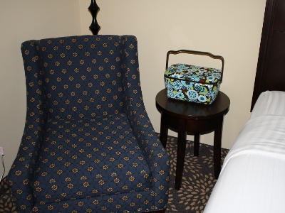 Sewing basket by hotel chair