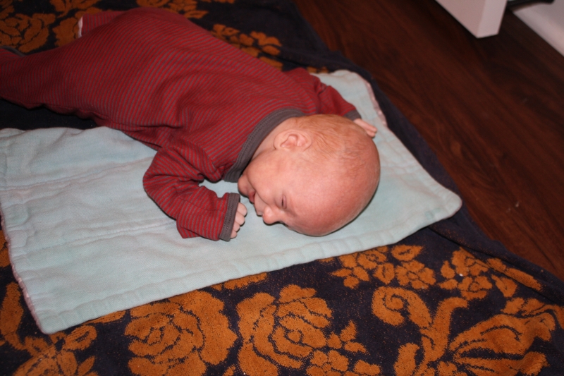 Louis "enjoying" tummy time