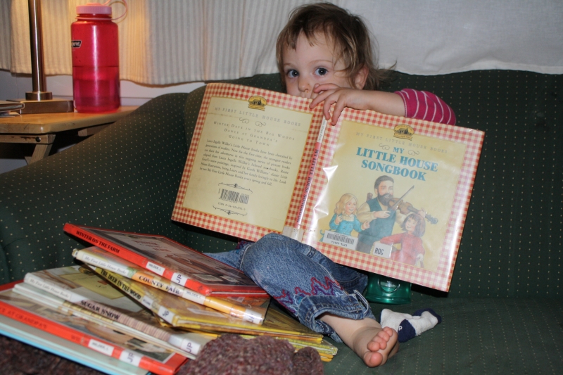 Tirzah Mae and her favorite "My First Little House Book"