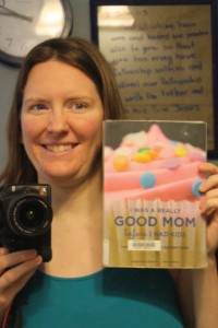 Me with book "I was a Good Mom Before I had Kids"